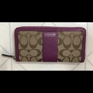 Coach Signature accordion zip wallet purple brown
